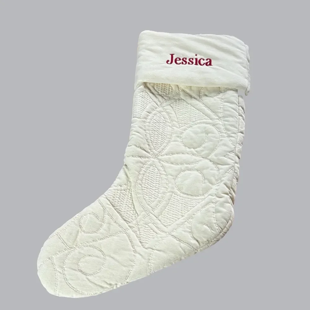 Pottery Barn cream colored quilted stocking with Jessica embroidered